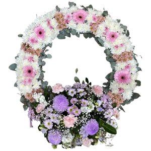 A wreath of white flowers and greenery, symbolizing sympathy and condolences