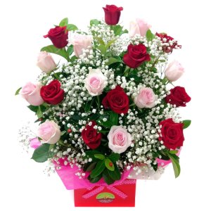 Red and pink roses in a red box, flowers arrangement