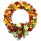 A white background showcases a sympathy wreath embellished with flowers and greenery, conveying heartfelt condolences