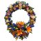 Fresh flower wreath with vibrant blooms in shades of pink, blue, and orange, arranged in a circular shape
