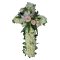 A sympathy cross adorned with white flowers and pink roses, symbolizing condolences and remembrance